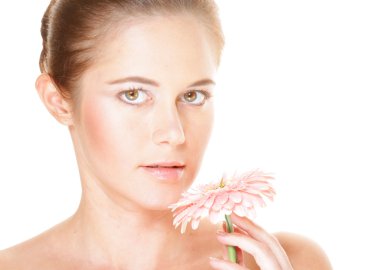 güzel bir kadın tutarak Pembe çiçek