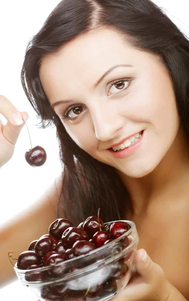 Mulher com cerejas sobre branco — Fotografia de Stock