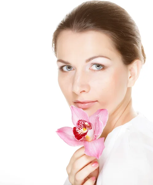 Beautiful woman with pink flower — Stock Photo, Image