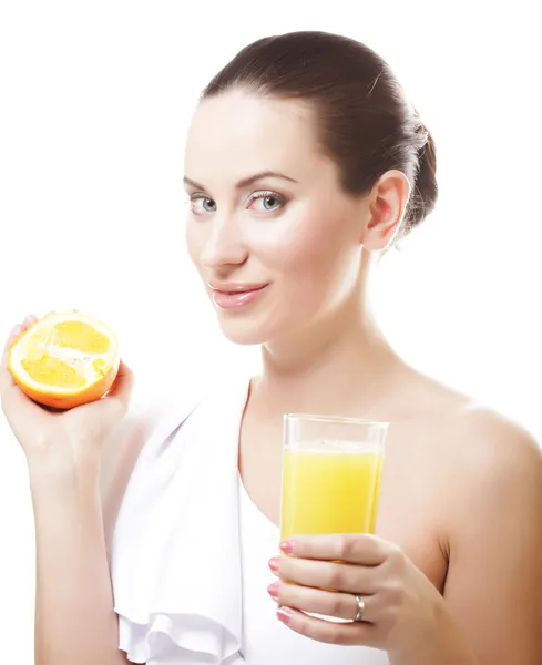 Woman drinking orange juice Royalty Free Stock Images