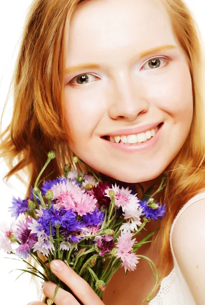 Young beautiful woman with flowers — Stock Photo, Image