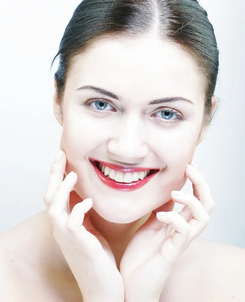 Beautiful woman face with clean skin — Stock Photo, Image