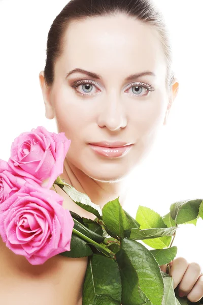 Mulher com rosas rosa — Fotografia de Stock