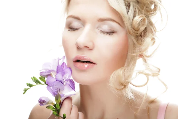 Beautiful woman with lilac flower — Stock Photo, Image