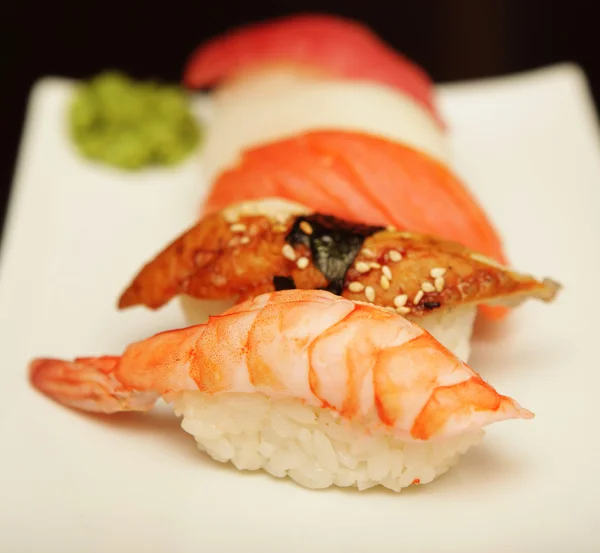 Sushi on a white plate. — Stock Photo, Image