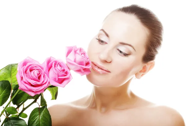 Mulher com rosas rosa — Fotografia de Stock