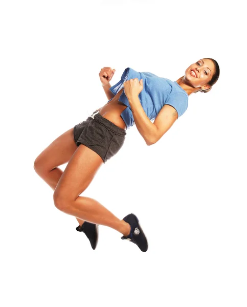 Fitness woman jumping of joy. — Stock Photo, Image