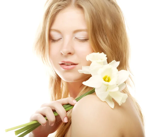 Girl smiling and with flower narcissus — Stock Photo, Image