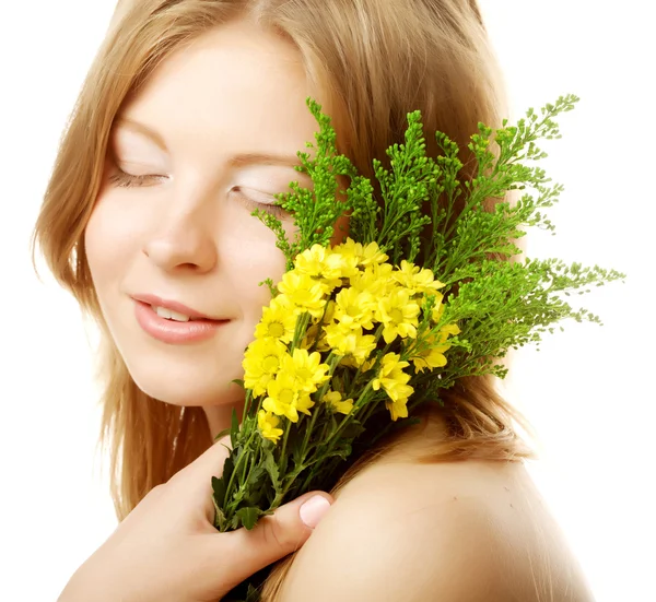 Woman with small yellow flowers — Stock Photo, Image