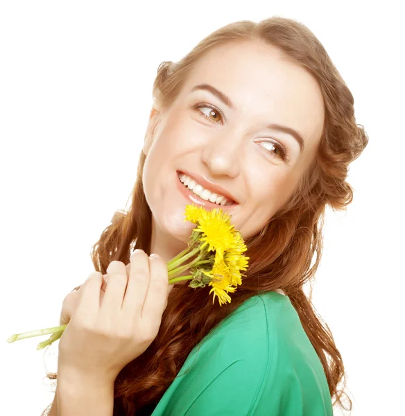 Woman with dandelion bouquet Stock Image