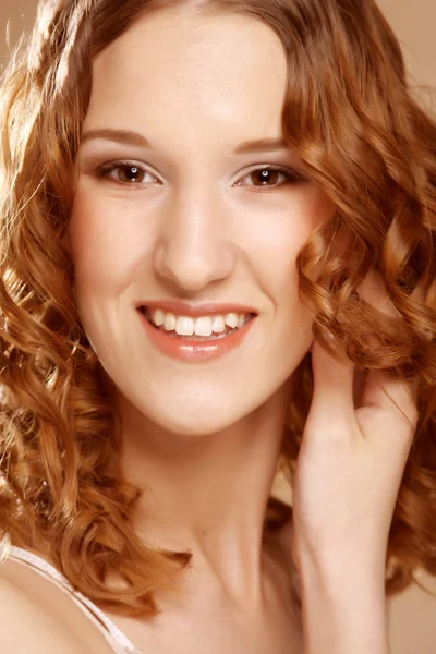 Image of beautiful young woman with curly hair — Stock Photo, Image