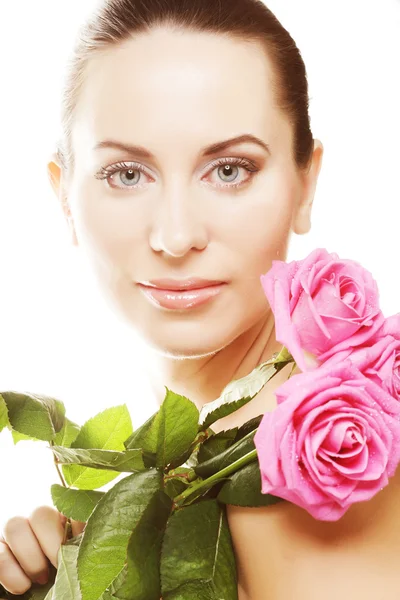 Kobieta z różowymi różami — Zdjęcie stockowe
