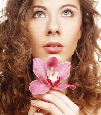 güzel bir kadın ile pembe orkide