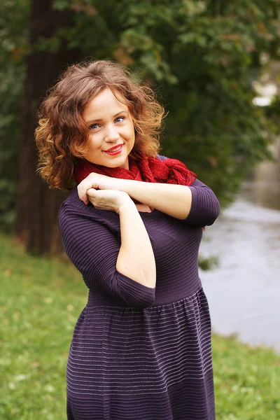 Woman near the river in autumn season — Stock Photo, Image