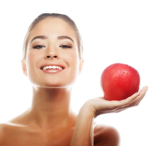 Atractiva joven con una manzana — Foto de Stock