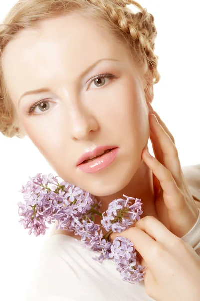 Menina primavera com flores lilás . — Fotografia de Stock