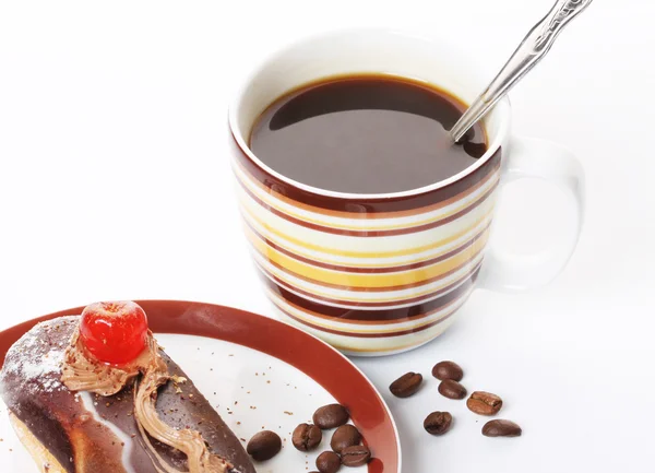 Schokoladenkuchen mit einer Tasse Kaffee — Stockfoto