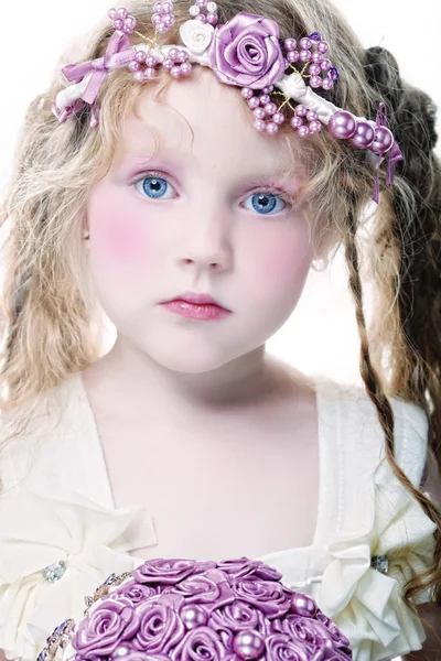 Little princess posing with bouquet — Stock Photo, Image