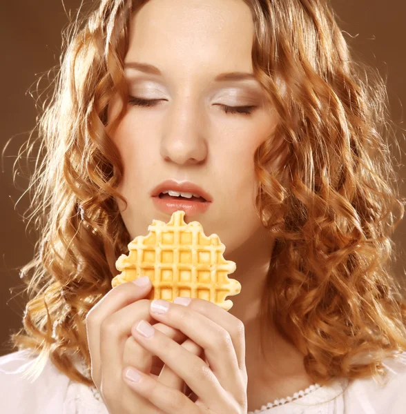 Schoonheid meisje met cookie — Stockfoto