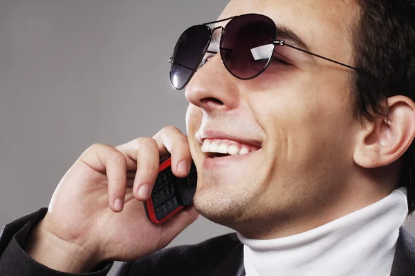 Casual man speaking on his phone — Stock Photo, Image