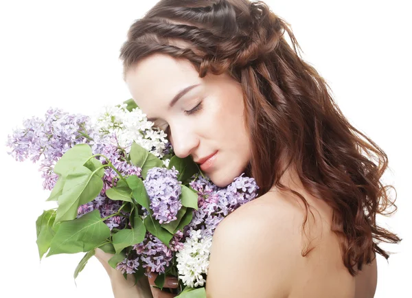 Menina primavera com flores lilás . — Fotografia de Stock