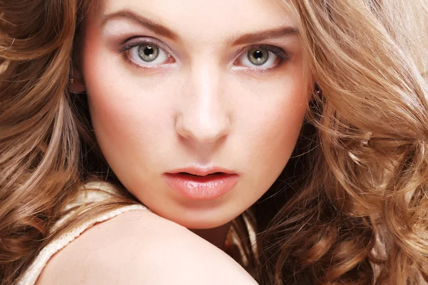 Young woman with curly hair — Stock Photo, Image