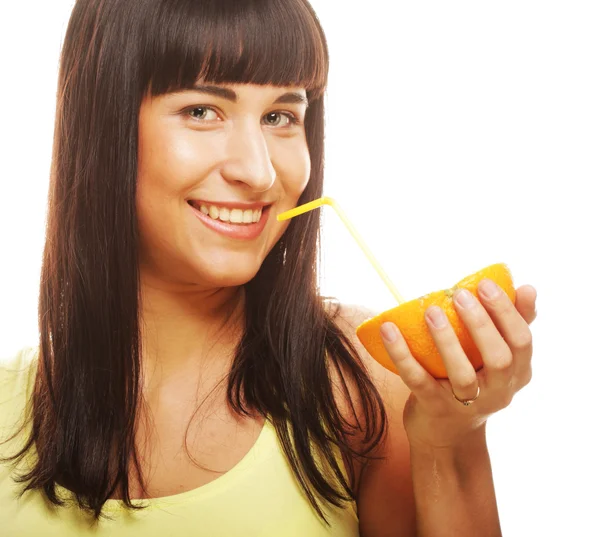 Beautiful woman drinking juice with straw — Stock Photo, Image