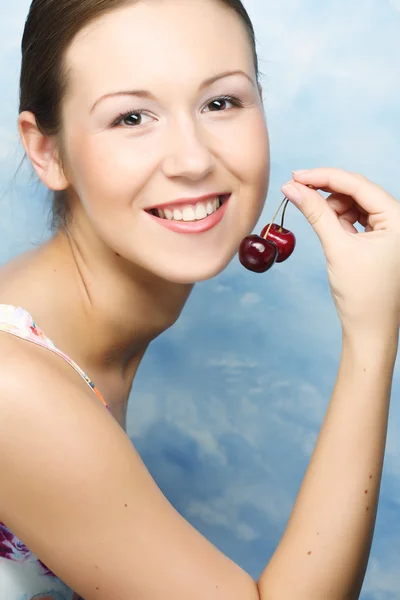 Woman with cherries — Stock Photo, Image