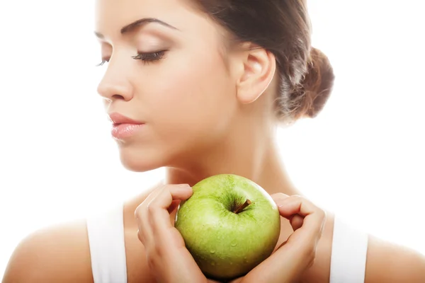 Cabeza de mujer sosteniendo manzana — Foto de Stock