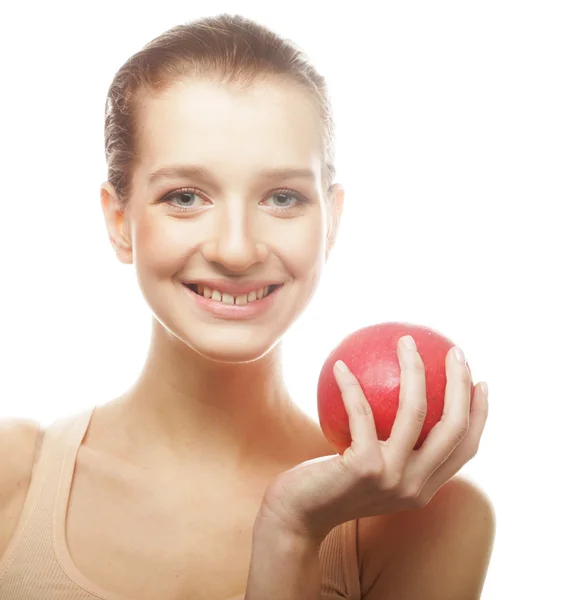 Aantrekkelijke jonge vrouw met een appel — Stockfoto