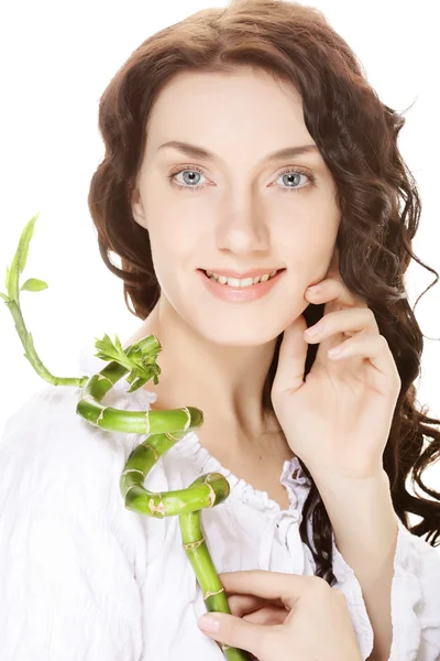 Young woman with bamboo. — Stock Photo, Image