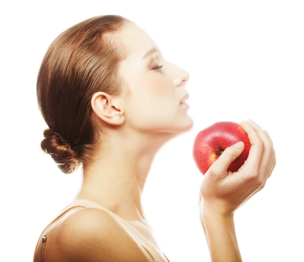 Atractiva joven con una manzana — Foto de Stock