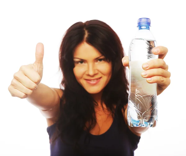 Sportiga kvinnan med flaska vatten — Stockfoto