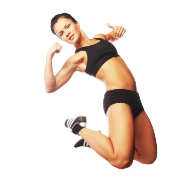 Fitness kadını sevinçten zıplıyor.