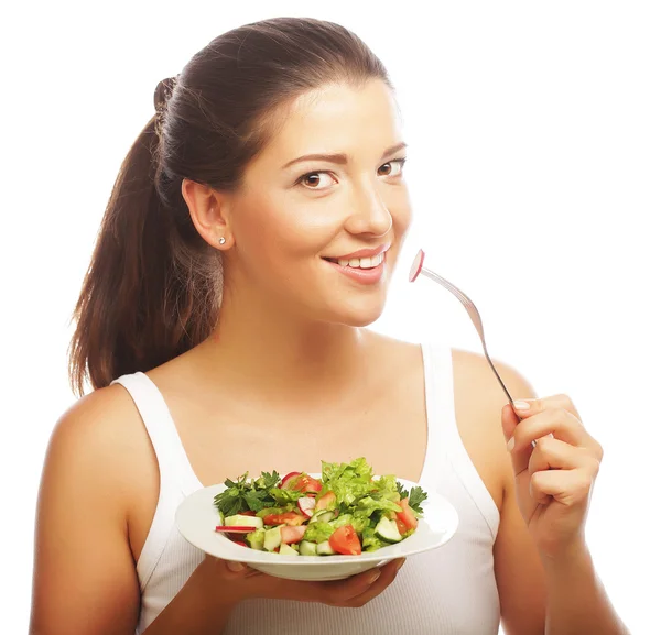 Femme avec salade sur fond blanc — Photo