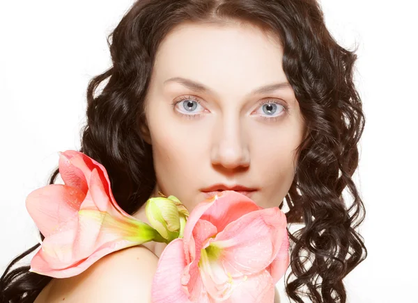 Woman and pink orchid — Stock Photo, Image