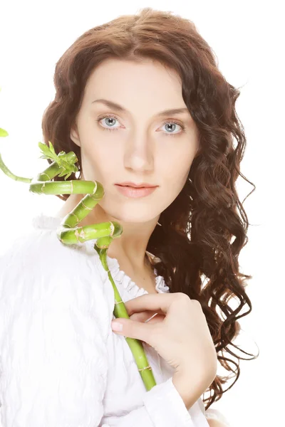 Young woman with bamboo. — Stock Photo, Image