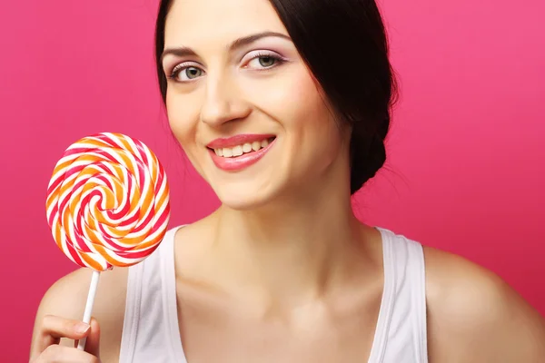 Woman with candy — Stock Photo, Image