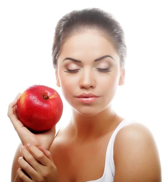 Attraktive junge Frau mit einem Apfel — Stockfoto