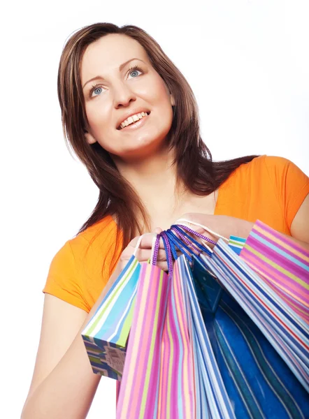 Žena šťastná, drží nákupní tašky. — Stock fotografie