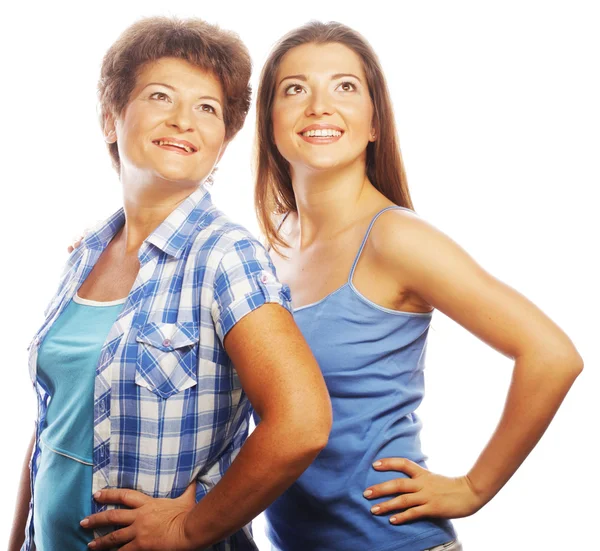 Mother and adult daughter looking up — Stock Photo, Image