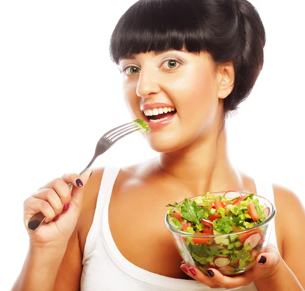 Young funny woman eating salad — Stock Photo, Image