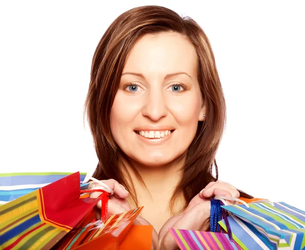 Mulher feliz segurando sacos de compras . — Fotografia de Stock