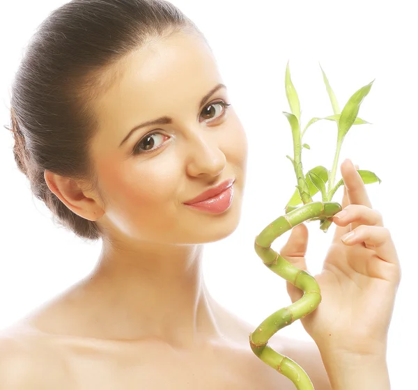 Young beautiful woman with bamboo — Stock Photo, Image