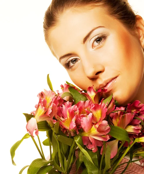 Mulher com flores rosa — Fotografia de Stock