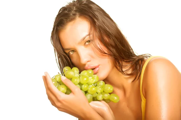 Woman with bunch of grapes — Stock Photo, Image