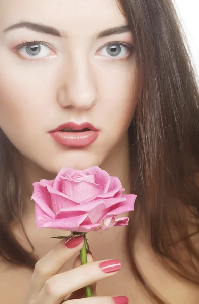 Woman with pink rose — Stock Photo, Image