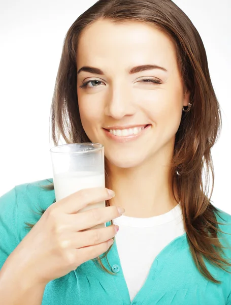 Young lady having a glass of milk Royalty Free Stock Photos