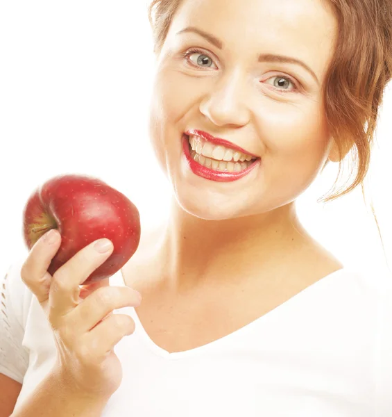 Giovane ragazza con una mela rossa in mano — Foto Stock