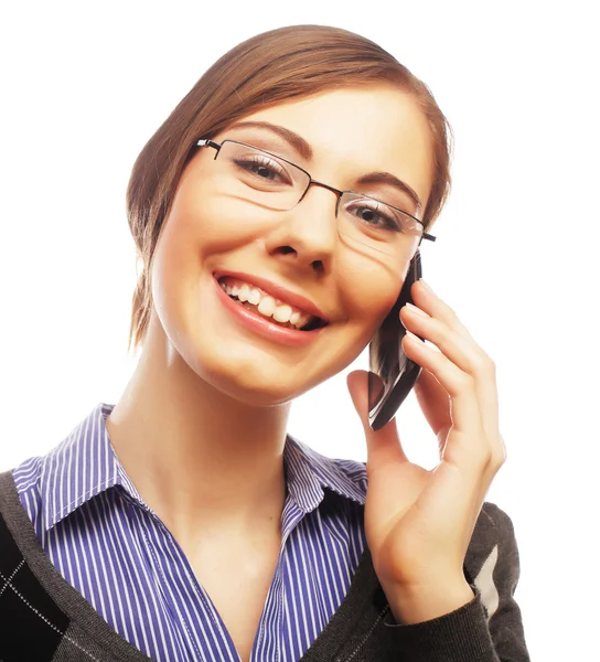 Mujer con móvil sonriendo apuntando hacia arriba — Foto de Stock